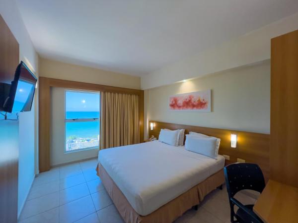 Praiamar Express Hotel : photo 2 de la chambre chambre double supérieure - vue sur mer