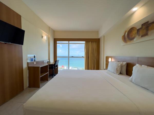 Praiamar Express Hotel : photo 4 de la chambre chambre double supérieure - vue sur mer