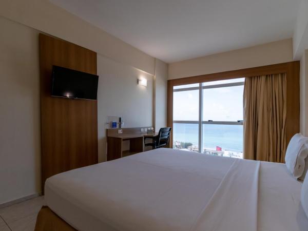 Praiamar Express Hotel : photo 5 de la chambre chambre double supérieure - vue sur mer