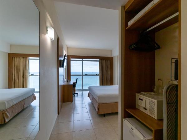 Praiamar Express Hotel : photo 8 de la chambre chambre double supérieure - vue sur mer