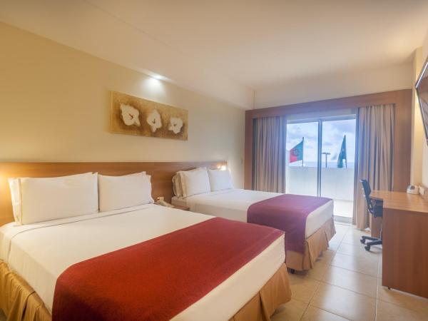 Praiamar Express Hotel : photo 1 de la chambre chambre double de luxe - vue sur mer - non-fumeurs