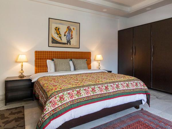 Neelam Bed & Breakfast : photo 2 de la chambre chambre lit king-size deluxe avec salle de bains privative