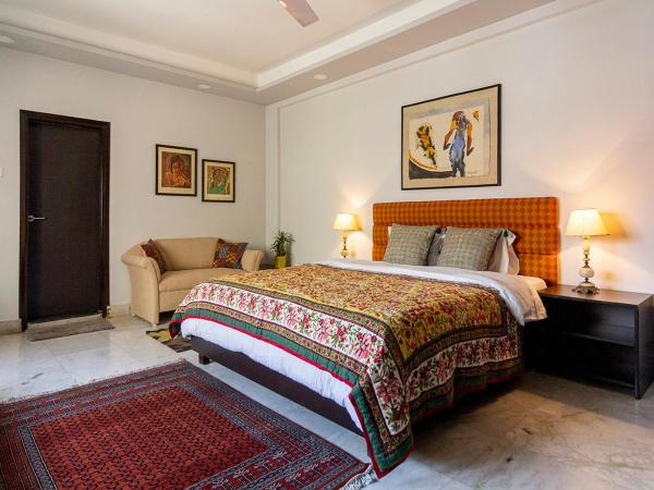 Neelam Bed & Breakfast : photo 7 de la chambre chambre lit king-size deluxe avec salle de bains privative