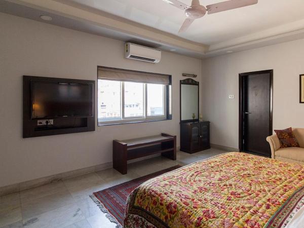 Neelam Bed & Breakfast : photo 8 de la chambre chambre lit king-size deluxe avec salle de bains privative