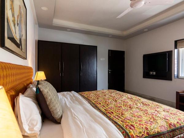 Neelam Bed & Breakfast : photo 9 de la chambre chambre lit king-size deluxe avec salle de bains privative