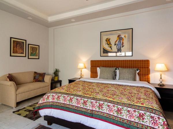 Neelam Bed & Breakfast : photo 10 de la chambre chambre lit king-size deluxe avec salle de bains privative