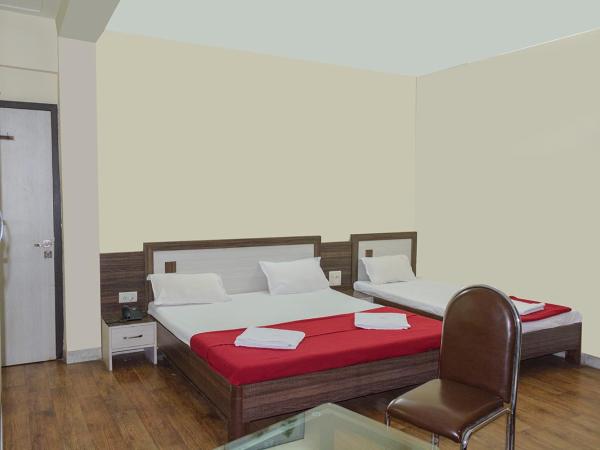 Hotel Mukesh Residency : photo 4 de la chambre chambre quadruple standard
