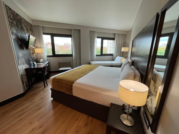 Eurostars Monumental : photo 1 de la chambre chambre double ou lits jumeaux avec lit d'appoint