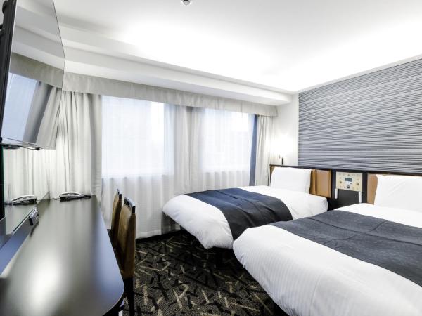 APA Hotel & Resort Roppongi Ekihigashi : photo 1 de la chambre chambre lits jumeaux