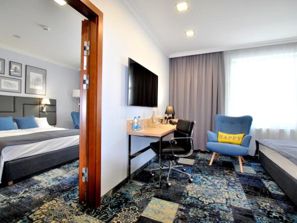 Hotel Włoski Italia Boutique Old Town Poznań : photo 5 de la chambre chambre familiale