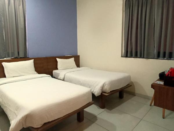 Sharman Suites : photo 10 de la chambre chambre lits jumeaux standard