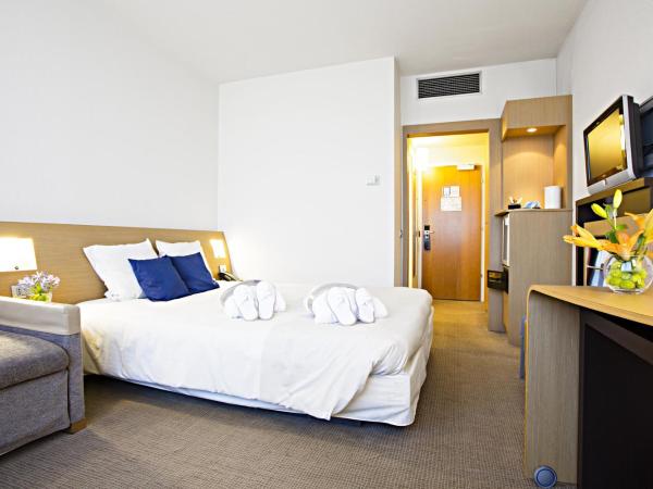 Novotel Genova City : photo 1 de la chambre chambre supérieure avec 1 lit double et 1 canapé-lit