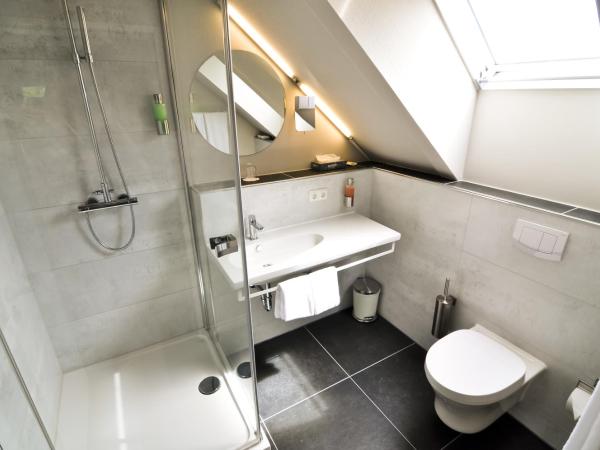 Amalienburg - Boutique & Boarding Hotel : photo 7 de la chambre chambre triple confort