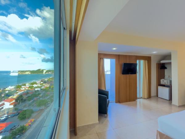 Praiamar Express Hotel : photo 1 de la chambre chambre de luxe - vue sur mer et balcon