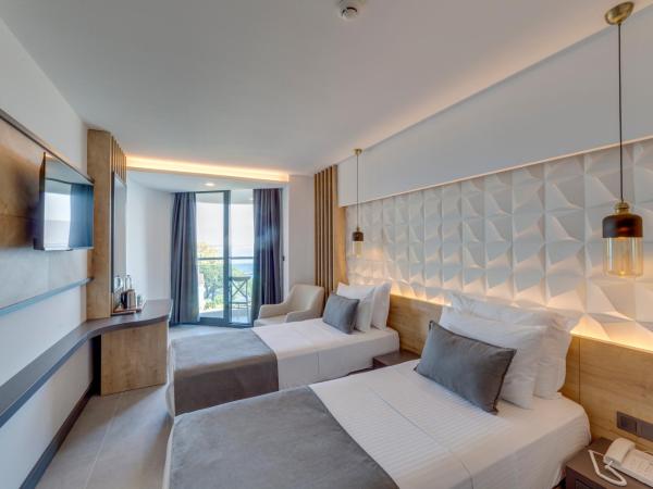 SIGNATURE BLUE RESORT : photo 1 de la chambre chambre double deluxe