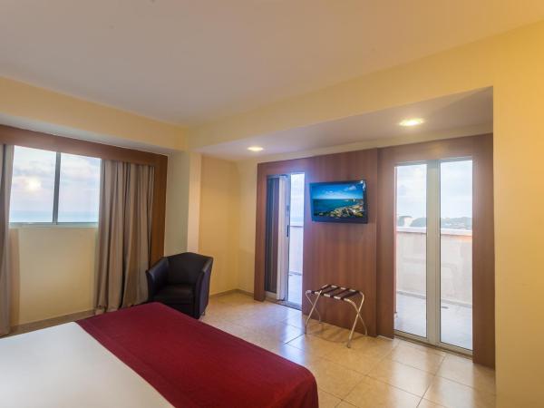 Praiamar Express Hotel : photo 6 de la chambre chambre de luxe - vue sur mer et balcon
