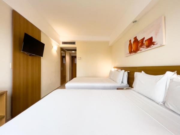 Praiamar Express Hotel : photo 8 de la chambre chambre standard avec 2 lits doubles