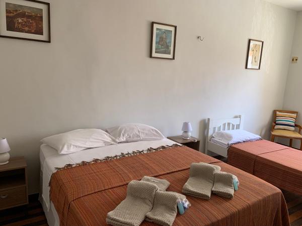 Casa do Sol Fortaleza : photo 1 de la chambre chambre triple avec salle de bains privative