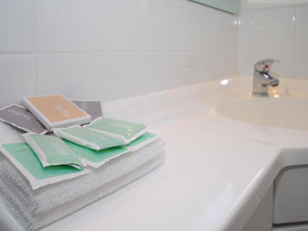 Takapuna Motor Lodge : photo 3 de la chambre studio lit queen-size 