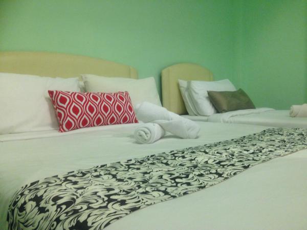 Woodpecker Lodge, Kuching : photo 6 de la chambre chambre triple standard