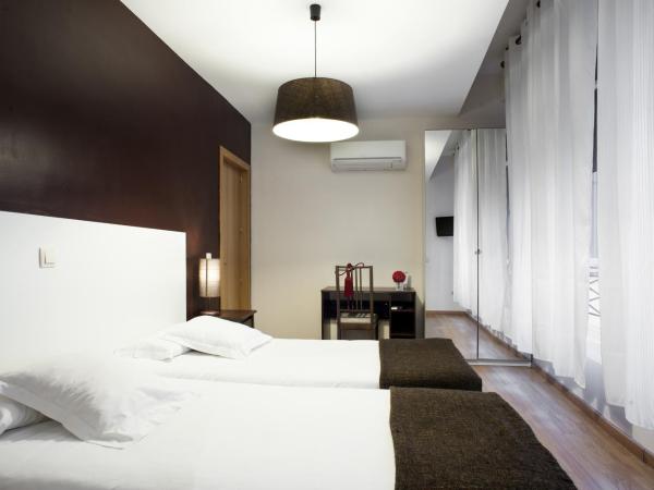 THC Gran Via Hostel : photo 9 de la chambre chambre lits jumeaux