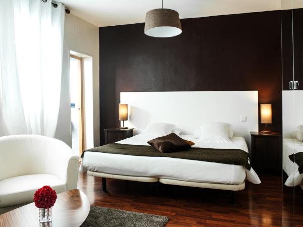 THC Gran Via Hostel : photo 3 de la chambre chambre double ou lits jumeaux supérieure