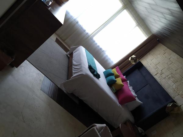 Hotel Beló Isla Mujeres - All Inclusive : photo 8 de la chambre suite junior de luxe avec 1 lit king-size