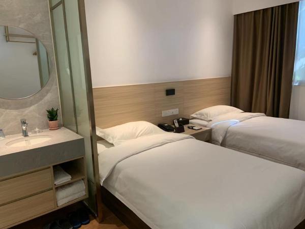 Guangzhou Fangyuan Hotel : photo 3 de la chambre chambre lits jumeaux - vue sur jardin