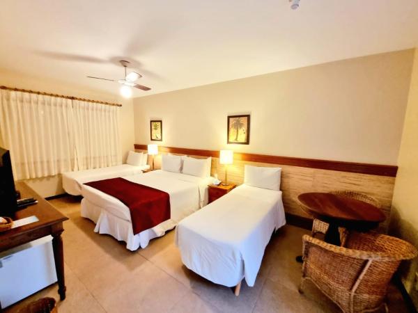 Pousada Corsario Buzios : photo 2 de la chambre chambre quadruple - vue sur jardin