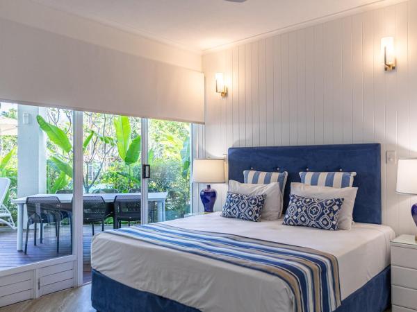 Beaches Holiday Apartments - Official Onsite Reception & Check In : photo 4 de la chambre deluxe two-bedroom apartment with pool deck access