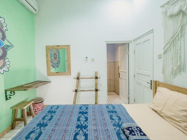 Happy Buddha Yogyakarta : photo 9 de la chambre chambre double standard avec climatisation