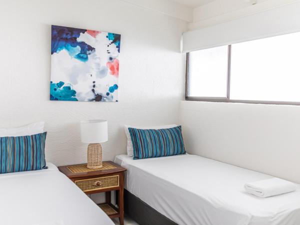 Beachfront Terraces with Onsite Reception & Check In : photo 6 de la chambre appartement 2 chambres - vue sur jardin