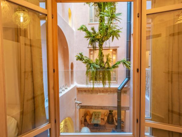 Mama Lova : photo 1 de la chambre chambre triple deluxe