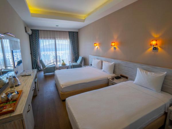 Azka Hotel : photo 3 de la chambre chambre deluxe double ou lits jumeaux