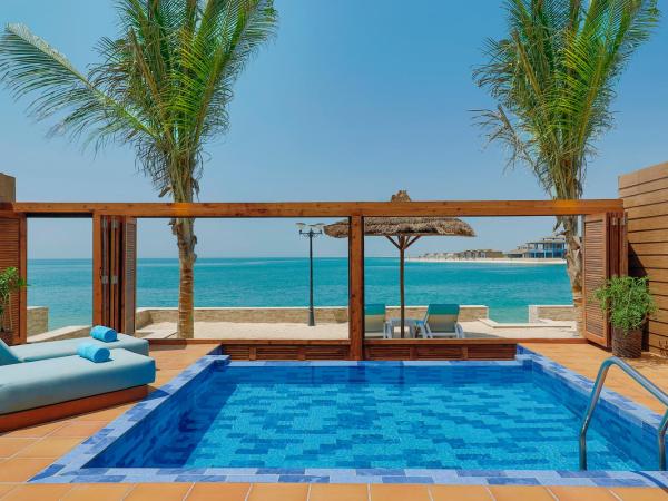 Anantara World Islands Dubai Resort : photo 4 de la chambre villa 1 chambre anantara avec piscine - côté plage et coucher de soleil