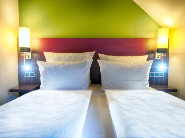 Leonardo Hotel & Residenz Muenchen : photo 7 de la chambre chambre quadruple confort