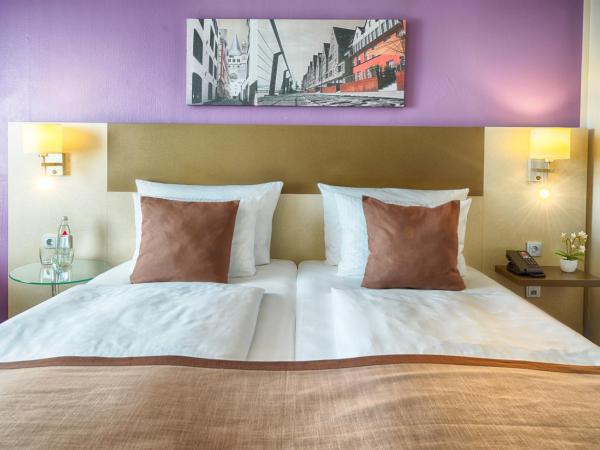 Leonardo Hotel Köln : photo 6 de la chambre chambre double ou lits jumeaux supérieure