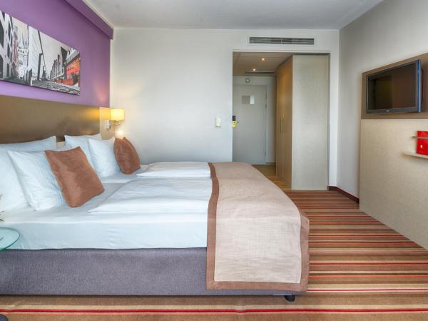 Leonardo Hotel Köln : photo 7 de la chambre chambre double ou lits jumeaux supérieure