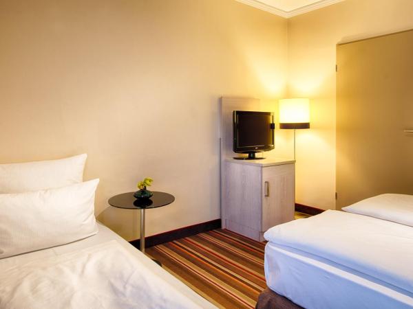 Leonardo Hotel & Residenz Muenchen : photo 7 de la chambre chambre triple confort