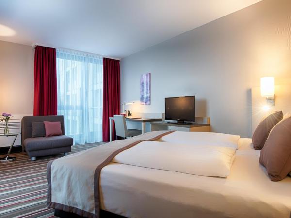 Leonardo Hotel Hannover Airport : photo 2 de la chambre chambre lits jumeaux supérieure
