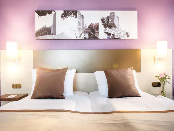 Leonardo Hotel Hannover Airport : photo 10 de la chambre chambre lits jumeaux supérieure