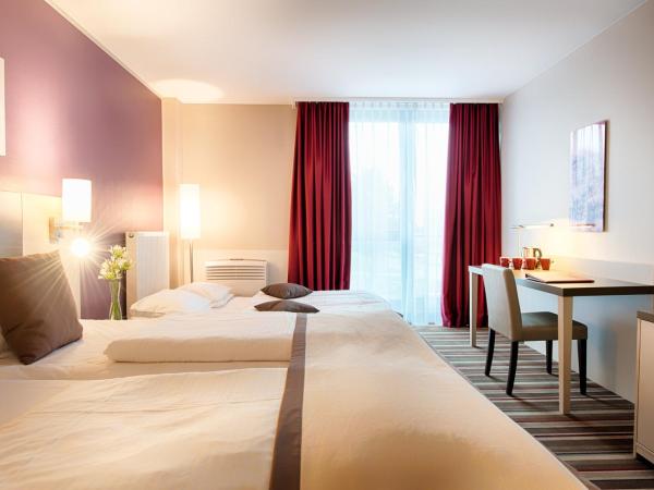Leonardo Hotel Hannover Airport : photo 2 de la chambre chambre familiale triple confort 
