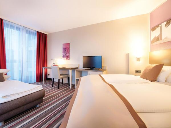 Leonardo Hotel Hannover Airport : photo 2 de la chambre chambre familiale triple supérieure