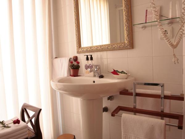 Hostal Antigua Morellana : photo 3 de la chambre chambre lits jumeaux