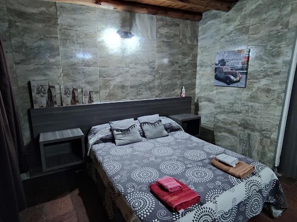 Hostel Ruca Potu : photo 2 de la chambre chambre quadruple avec salle de bains privative