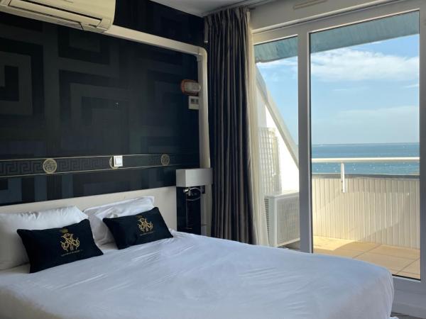 Appart'hôtel Le Trianon : photo 1 de la chambre appartement - vue sur mer