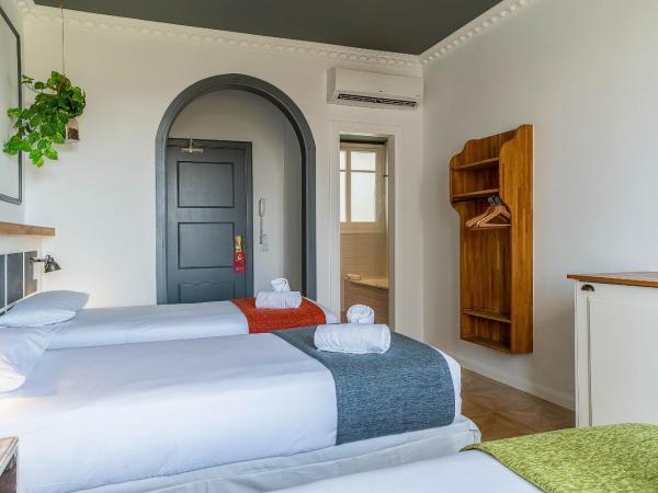 Casa Gracia : photo 4 de la chambre  chambre triple - vue sur ville