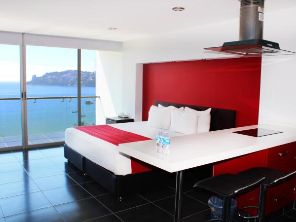 Ramada by Wyndham Acapulco Hotel & Suites : photo 2 de la chambre chambre lit king-size - non-fumeurs