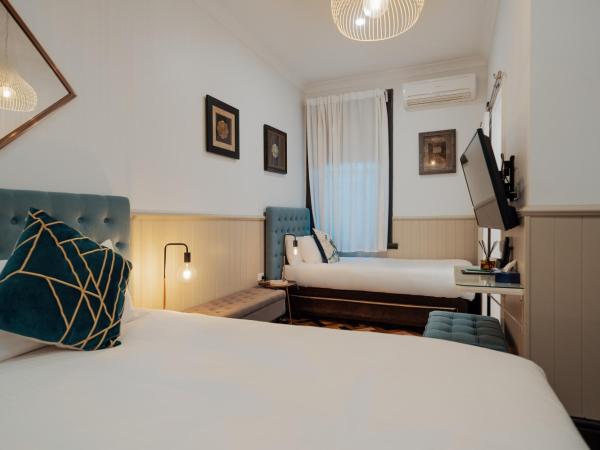 Cremorne Point Manor : photo 3 de la chambre chambre triple deluxe