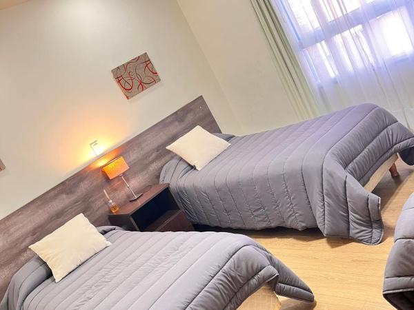 Hotel ATEPSA : photo 1 de la chambre chambre triple avec salle de bains privative